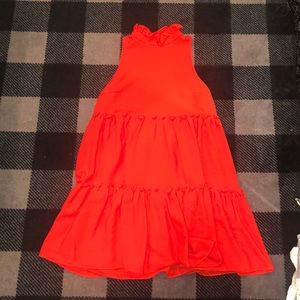 Red dress with ruffle detail and high neck ruffle